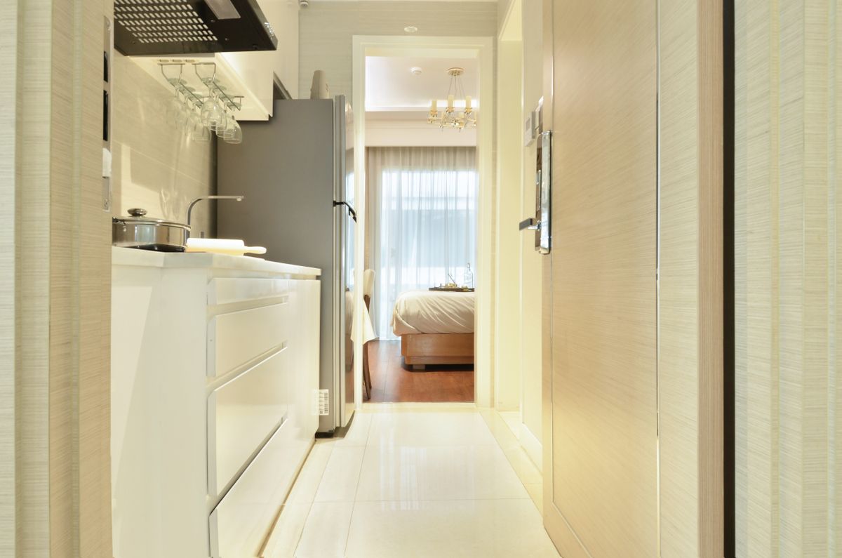 A clean, tidy home interior with a spotless kitchen